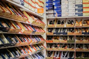 Lots of shoes in boxes